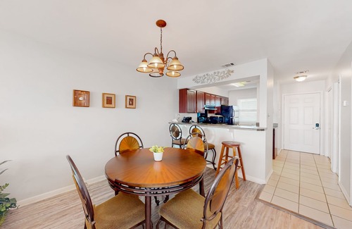 Sunnyside House | Bright Gulf-front condo with two balconies, pool, central AC, & W/D