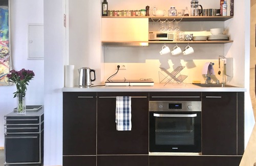 Eichet Apartment | Bright loft with roof terrace