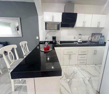 Playacar Fase II Apartment | Bright Luxury Apartment with swimming pool