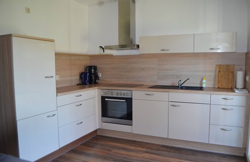 Wangerland Apartment | Bright, spacious comfort apartment with private garden and walk-in shower.