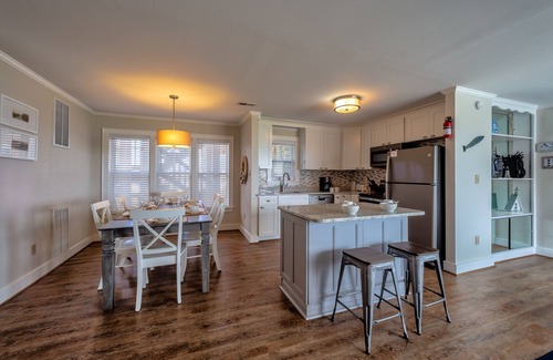 Avon Condo | Bright, updated oceanfront home with shared pool, private deck, & great views