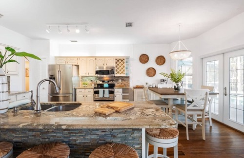 Palm Harbor House | Bring Your Boat Heated Pool spa Dock Beach