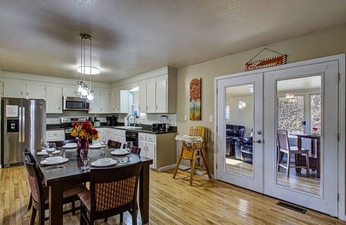 Pigeon Forge Cabin | Bryan's Brookside Bungalow w/Hot Tub, Arcade, Fenced Yard, & next to Stampede!