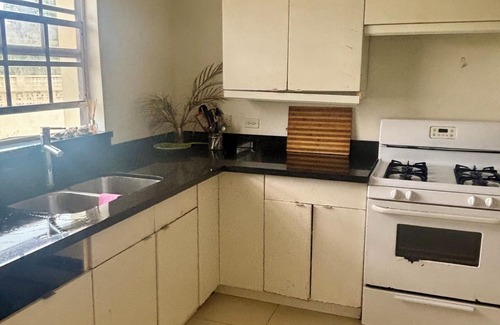 Clermont House | Budget-Friendly Hilltop Bungalow with Island Breeze & Tropical Orchard