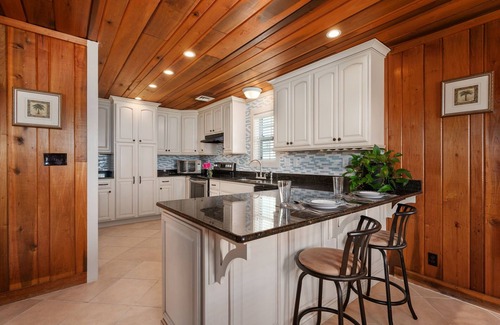 Kill Devil Hills Apartment | Budget & Pup-Friendly Oceanside! Classic OBX Style w/Shiplap, Walk-In Showers!