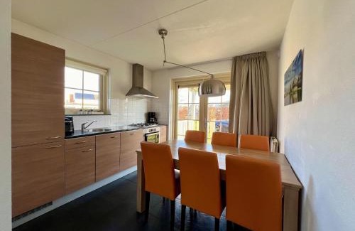 Municipality of Nissewaard House | Bungalow in Holland by Water with Sauna