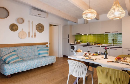 Bibione Ski Chalet | Bungalow Leccio trilocale 4 pax