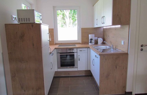 Damp House | Bungalow with terrace and heating