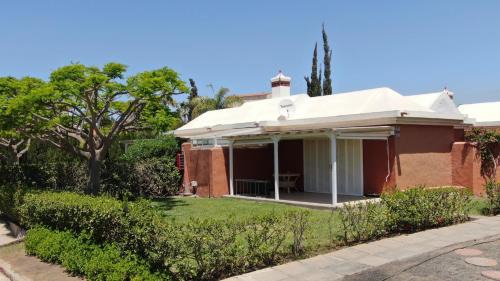 Maspalomas Ski Chalet | Bungalows Los Melocotones