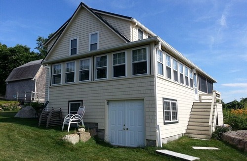 Gloucester House | Buoy 23: Direct waterfront cottage with deepwater dock on the Annisquam River