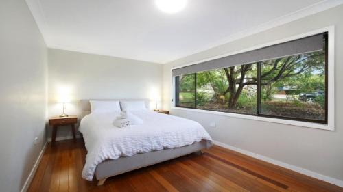 Macmasters Beach House | Bush Beach Hideaway Pet Friendly , Wifi Accom Holidays