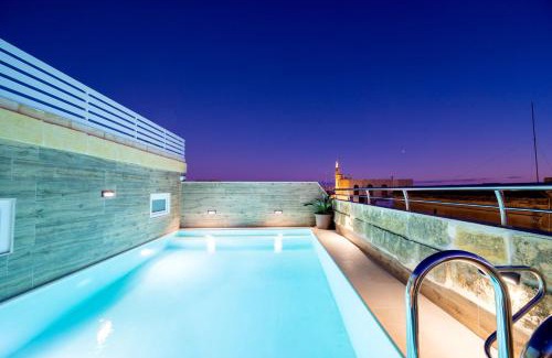 Ggantija House | C4 Retreats by Georges Boutique Living