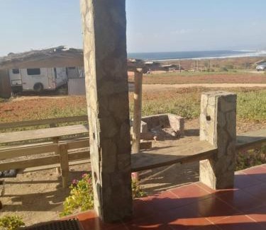 Pichilemu House | Cabaña a metros de la ola Punta de Lobos
