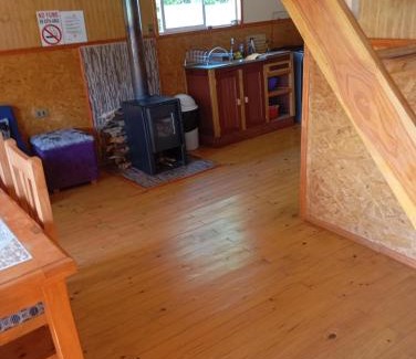 Hornopiren National Park Apartment | Cabañas a orillas de rio