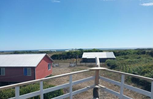 Teodoro Schmidt House | Cabañas playa porma