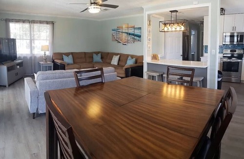 Butler Beach House | Cabana Escape – Waterfront Oasis with Heated Pool and Spacious Outdoor Living