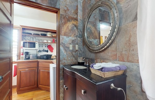 Hopkins Apartment | Cabana with WiFi and a shared pool, patio area, and grill - walk to the beach