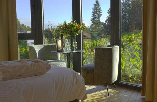 Incourt Hotel | Cabanes avec jacuzzi les pieds dans la vignes