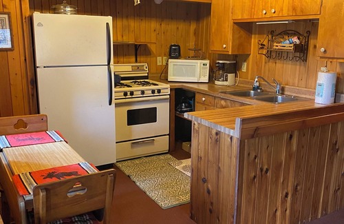 Au Train Cabin | Cabin 3 on the bank of the Autrain River next to the Hiawatha Forest.