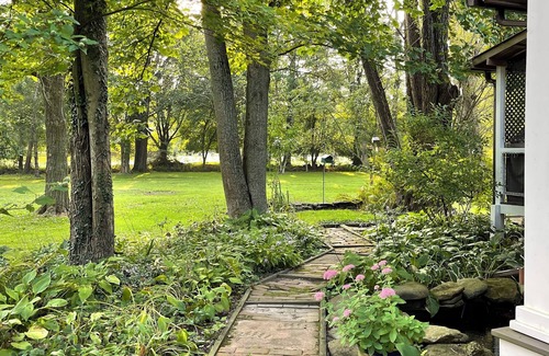 Bellville Cabin | Cabin By The Creek nestled on 3 acres with a hot tub in welcoming Bellville