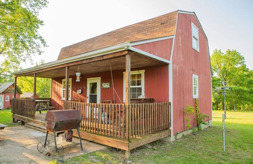 Lebanon House | Cabin, camping, and one mile of Niangua river to explore at this secluded cabin.