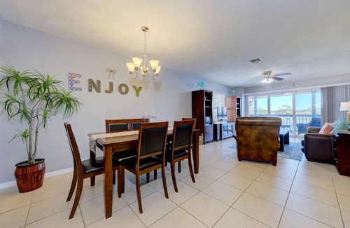 Indian Shores Apartment | Caddy's Boat House with waterway views and balcony sleeps 6