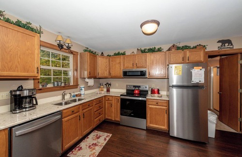 Townsend Cabin | Calling all Golf players! This home is located in a golf course community.