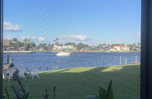 Fort Myers Shores House | Caloosahatchee River house with stunning water views, minutes to beaches.