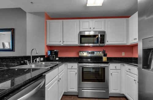 Panama City Beach Condo | Calypso 2004W BEACH SIDE - Beach Chairs, Free Activities Each Day, and More