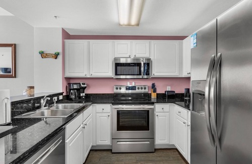 Panama City Beach Condo | Calypso 402 East - Beach Chairs, 2 King Suites, Free Activities Daily!