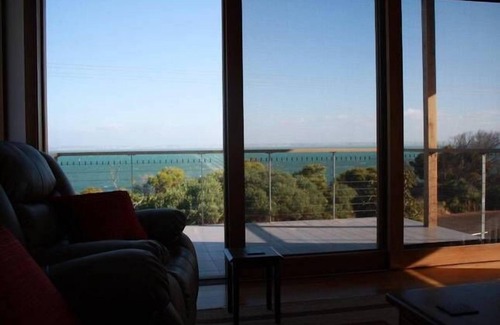 Kingscote House | Camelot - opposite the foreshore. Stunning sea views. Now with Free Wi Fi