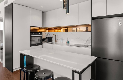 Cremorne Apartment | Camillea - One-bedroom fifth-floor residence with MCG and city views.
