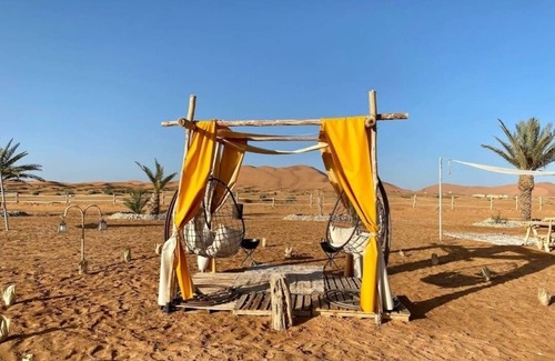 Merzouga RV Rental | Camle trekking land scape and camp fire enjoyable moments i