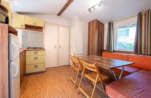 Sommieres House | Camping Le Domaine de Massereau* - Mobile home Comfort 3 rooms 4 people air-conditioned - TV