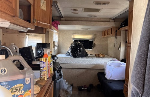 Harrison RV Rental | Camping, off grid… Generator and water provided.