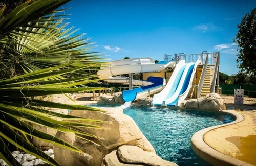 Sainte-Marie-la-Mer House | Campsite Le Sainte Marie * - EMERAUDE - 24m2 - 2 bedrooms - TV - COVERED TERRASS - 1 VEHICLE INCLUSIVE 4 persons