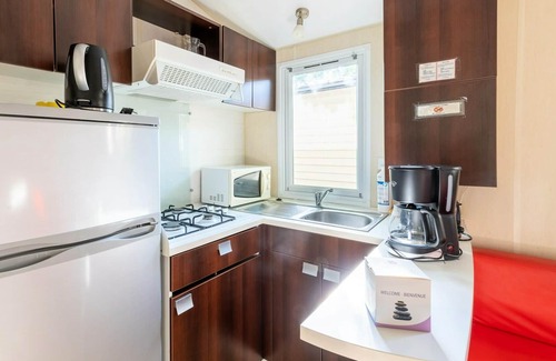 Alrance House | Campsite Les Cantarelles* - Loggia Confort 3 Rooms 4 People Air Conditioned - TV