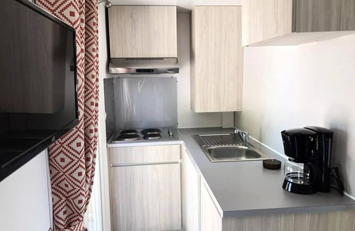 Le Grez House | Campsite Les Tournesols * - Mobilhome Evolution 45m2 (24m2+21m2 terrace) - 2 bedrooms 4 people