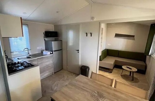 Paimboeuf House | Campsite Ushuaia Villages the Estuary * - Mobil home Comfort plus - 27m2 - 2 bedrooms + convertible - covered terrace 4 to 6 people - 4 pers. included in the tariff
