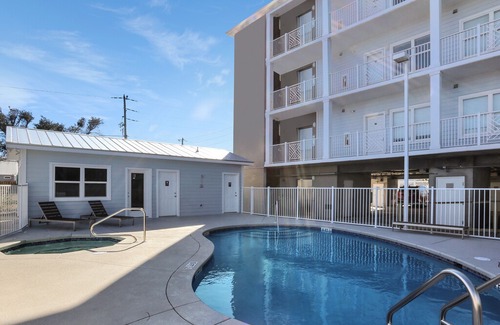 Mexico Beach Condo | Canal Front Condo in Mexico Beach with Community Pool and Boat Slip ~ Tranquil H
