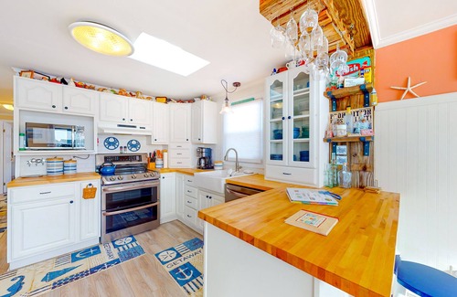 Montego Bay House | Canal front home with free WiFi, deck, private dock, shared pool & tennis