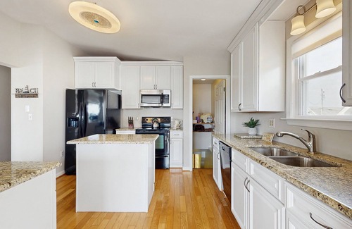 West Beach House | Canal-front house with private washer/driver, deck and outdoor shower
