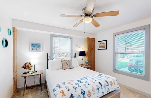 Rockport House | Canal-front retreat with dock/bay access, hot tub, covered deck, kayaks, & AC