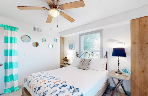Rockport House | Canal-front retreat with dock/bay access, hot tub, covered deck, kayaks, & AC