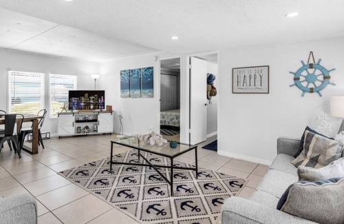 Key Largo Village House | Canal Front with Bay Access Home and private sandy beach.