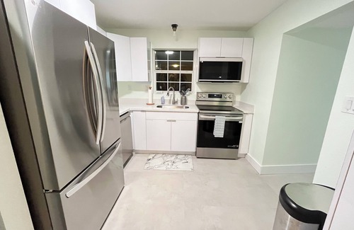 Weeki Wachee Gardens House | Canal home with direct river and gulf access, kayaks, hot tub, boat & motor inc
