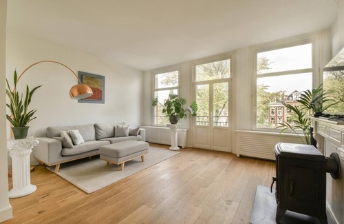 Helmersbuurt Apartment | Canal-View Apartment with Large Rooftop Terrace