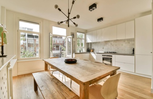 Helmersbuurt Apartment | Canal-View Apartment with Large Rooftop Terrace
