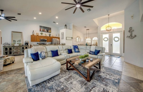 Pelican Villa | Capacious 4 BR/3 bath waterfront Villa with heated pool, spa, kayaks and bikes