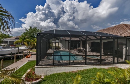 Pelican Apartment | Cape Coral, Pelican,4/3.5,family-friendly, West-Exp. sunset views,saltwaterCanal